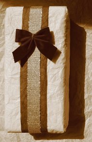 Christmas gift wrapped with crumpled parcel paper